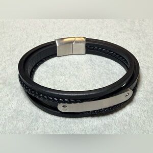 Men’s stainless steel and multilayer faux leather bracelet
8”
New